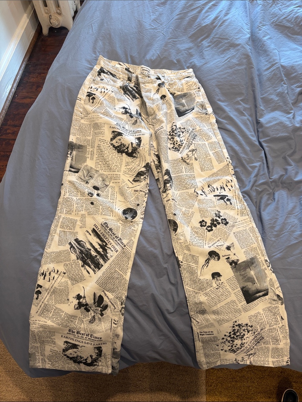 Reformation Black on Cream Newspaper-Print Wide-Leg Jeans
